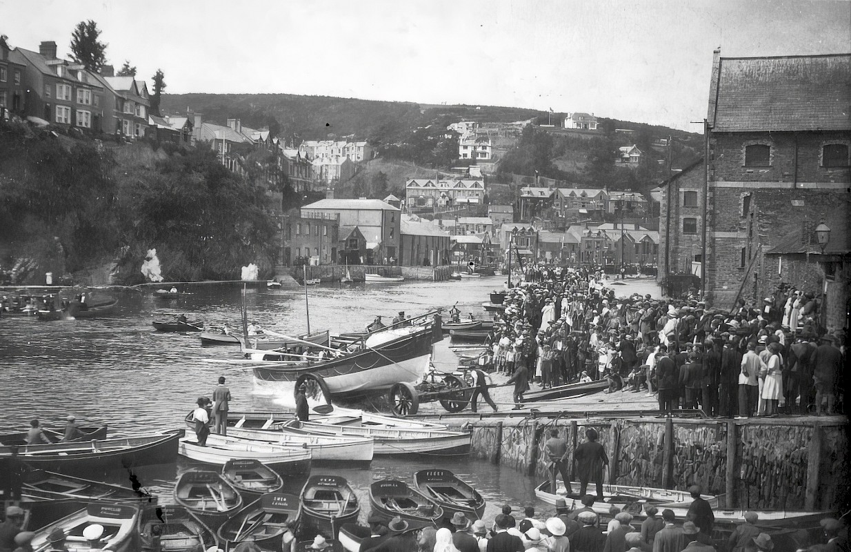 A large crowd watches Ryder being launched on the slipway